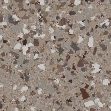 Speckled beige floor with embedded chips of various colors.