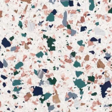 Terrazzo pattern with white background and multicolored specks of teal, pink, and navy.