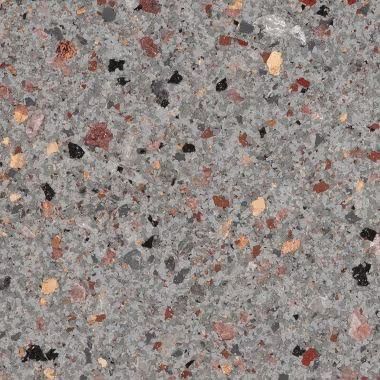 Gray speckled terrazzo surface with red, black, and tan aggregate.