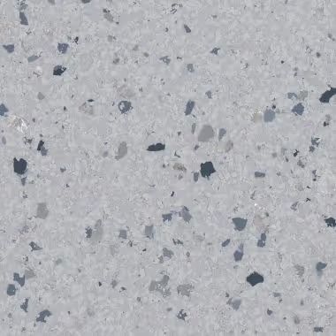 Gray speckled surface with embedded dark and light gray flecks.