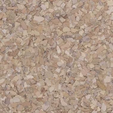 Close-up of a speckled beige cork surface with various irregular shapes and tones.