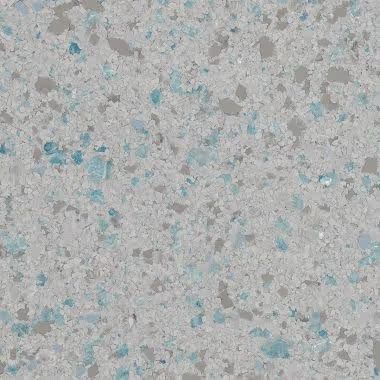 Gray quartz countertop with blue and gray flecks.