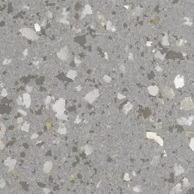 Gray terrazzo surface with various light-colored aggregate pieces.