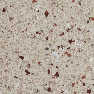 Beige speckled countertop with brown, red, and white flecks.
