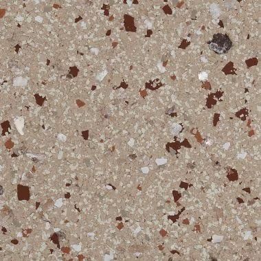 Tan speckled surface with dark brown and white chips embedded.
