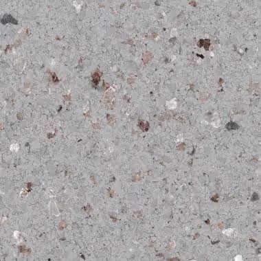 Gray speckled countertop with various small, colored inclusions.