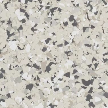 Speckled flooring with white, gray, and dark gray chips.