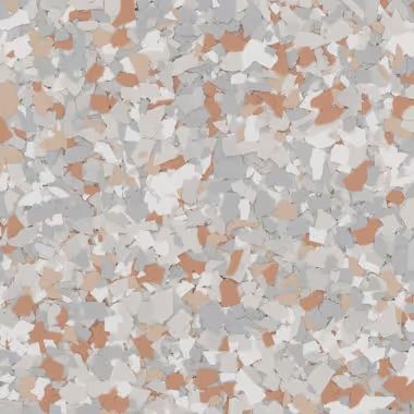 Floor with a speckled pattern in shades of gray, white, and rust.
