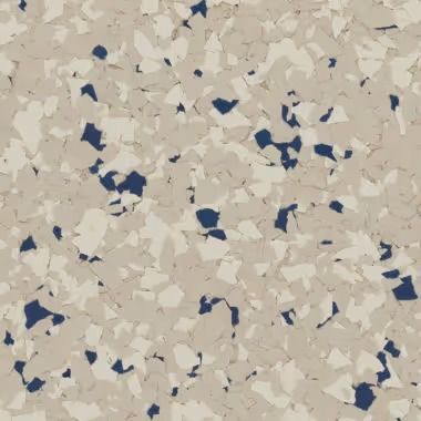 Tan, beige, and navy speckled floor covering.