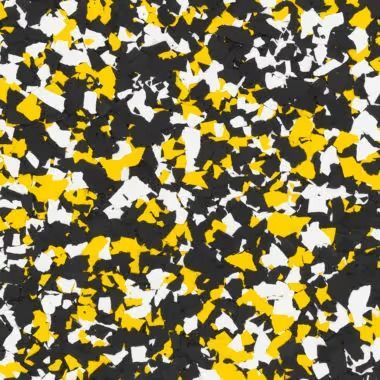 Black, white, and yellow speckled flooring pattern.