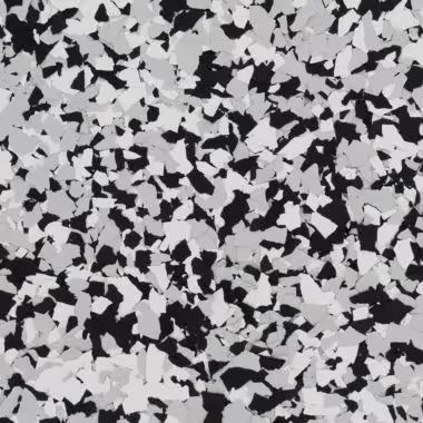 Black, white, and gray speckled floor coating with random, irregular patterns.