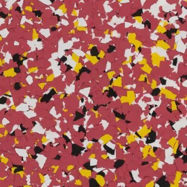 Red, yellow, black, and white speckled floor covering.