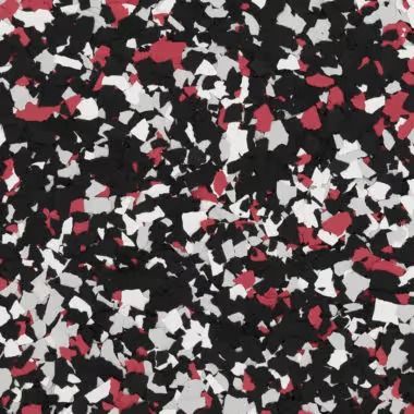 Speckled flooring with black, white, and red chips.