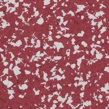 Red and white speckled floor covering.