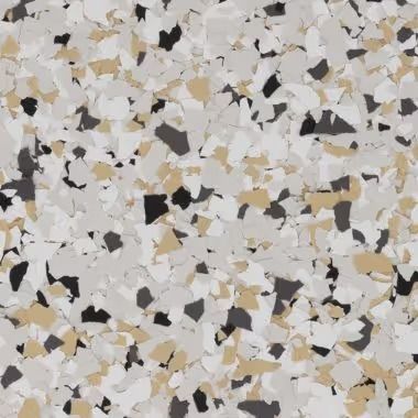 A speckled flooring pattern with gray, beige, and black chips.