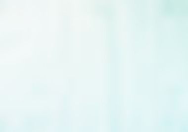 Light blue and white blurred background.