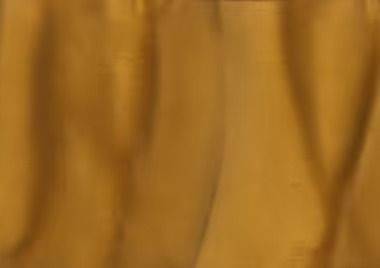 Golden-yellow fabric draped with vertical folds.