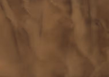 Brown sand texture with subtle light and shadow variations.