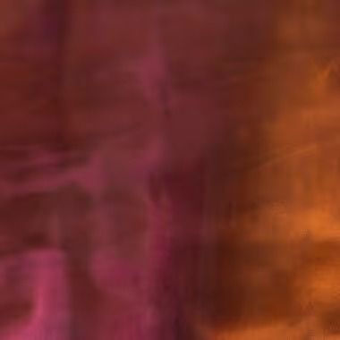 Abstract blend of pink, red, and orange colors with a blurred, vertical texture.