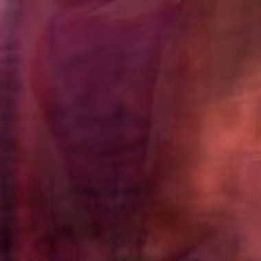 Abstract, blurry photo with reds and purples; a hint of a face is vaguely visible.