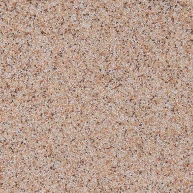 Pinkish-tan granite surface with flecks of darker minerals.