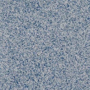 Blue and white speckled granite stone surface.
