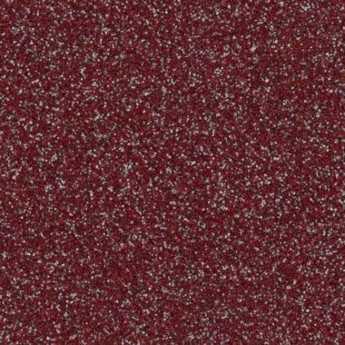 Dark red surface with speckled white and gray particles.