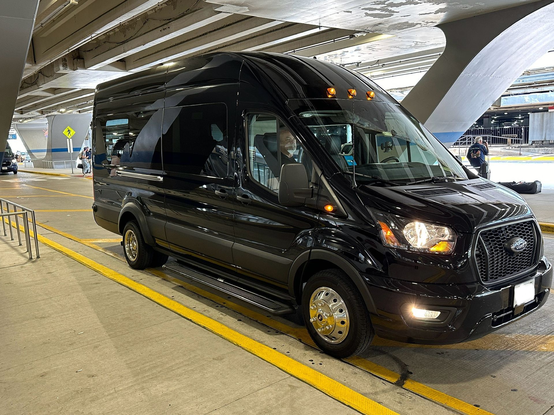 The scene highlights the convenience and professional service Rockford Rides at O'hare Airport