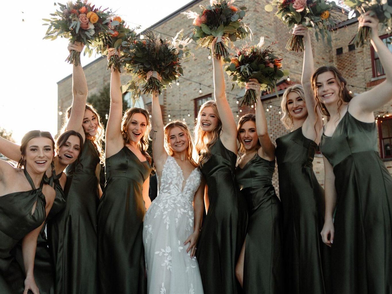 A joyful bachelorette party, with a group of women in matching dresses, laughing and celebrating