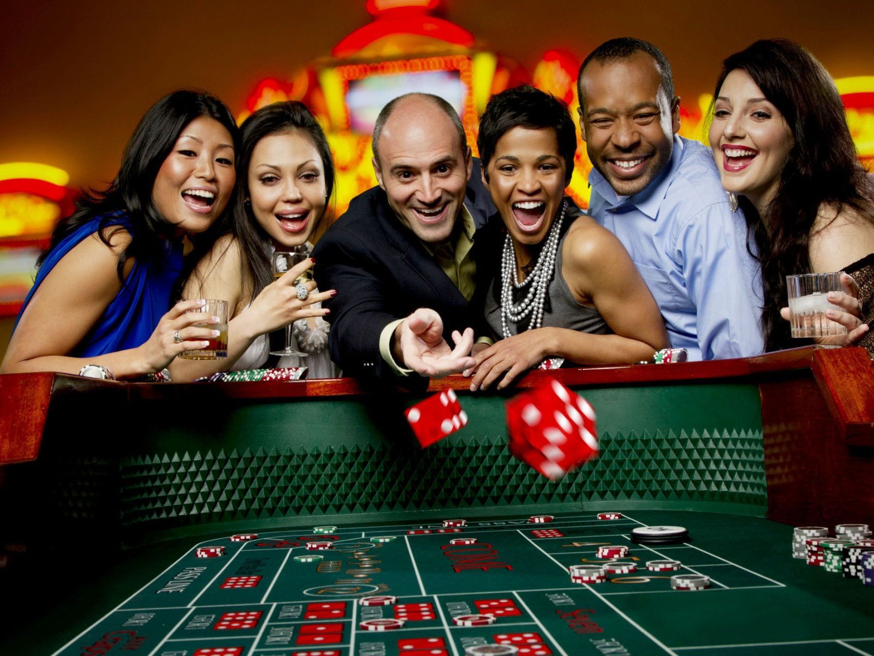 Two exuberant Chicago Bears fans are enjoying the game day atmosphere, dressed in team jerseys and sporting playful accessories like sunglasses, a headband, and fake mustaches. They embody the high spirits and camaraderie that fans can expect when traveling to a Bears game with Rockford Rides, which offers party bus services from Rockford to Chicago, ensuring fans arrive at Soldier Field ready to cheer on their team.