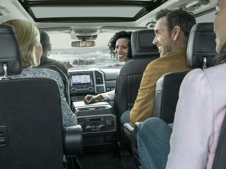Evening view of the Hard Rock Casino in Rockford, Illinois, featuring the iconic giant guitar sculpture at the entrance. Rockford Rides Shuttle Service offers safe and reliable transportation to and from the casino, ensuring a hassle-free experience for visitors.
