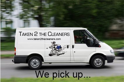 A taken 2 the cleaners van is driving down the road