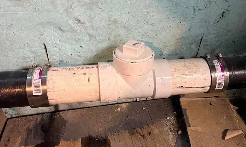 Plumbing cleanout installed on a drain line for sewer and drain cleaning access in Philadelphia. 