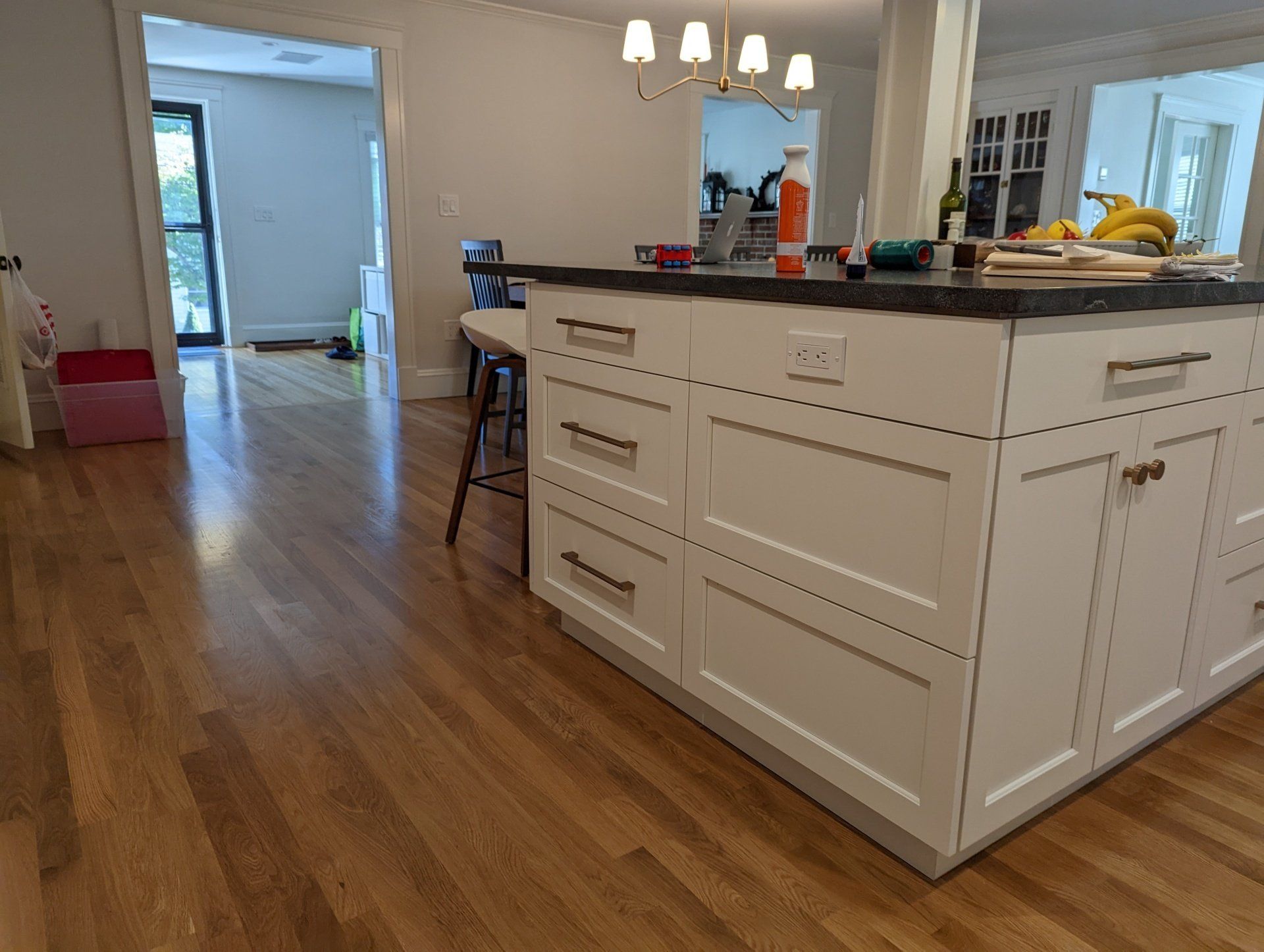 There is a large island in the middle of the kitchen.