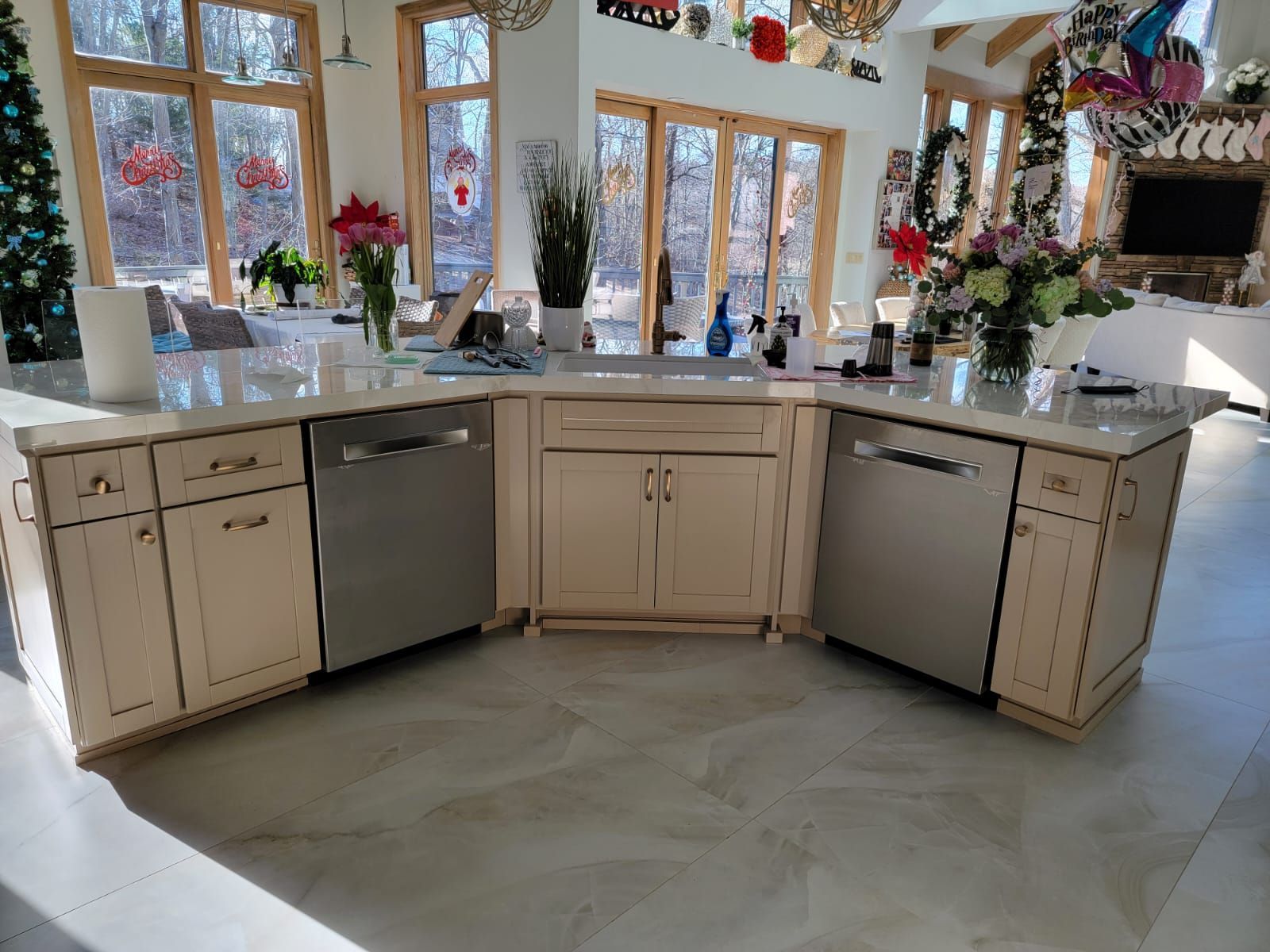 A kitchen with a lot of cabinets and stainless steel appliances