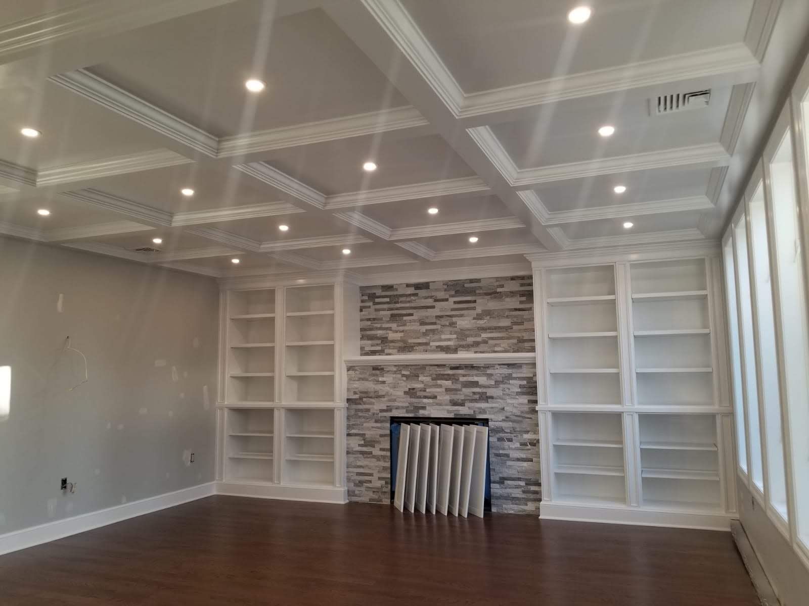 There is a fireplace in the middle of the room.