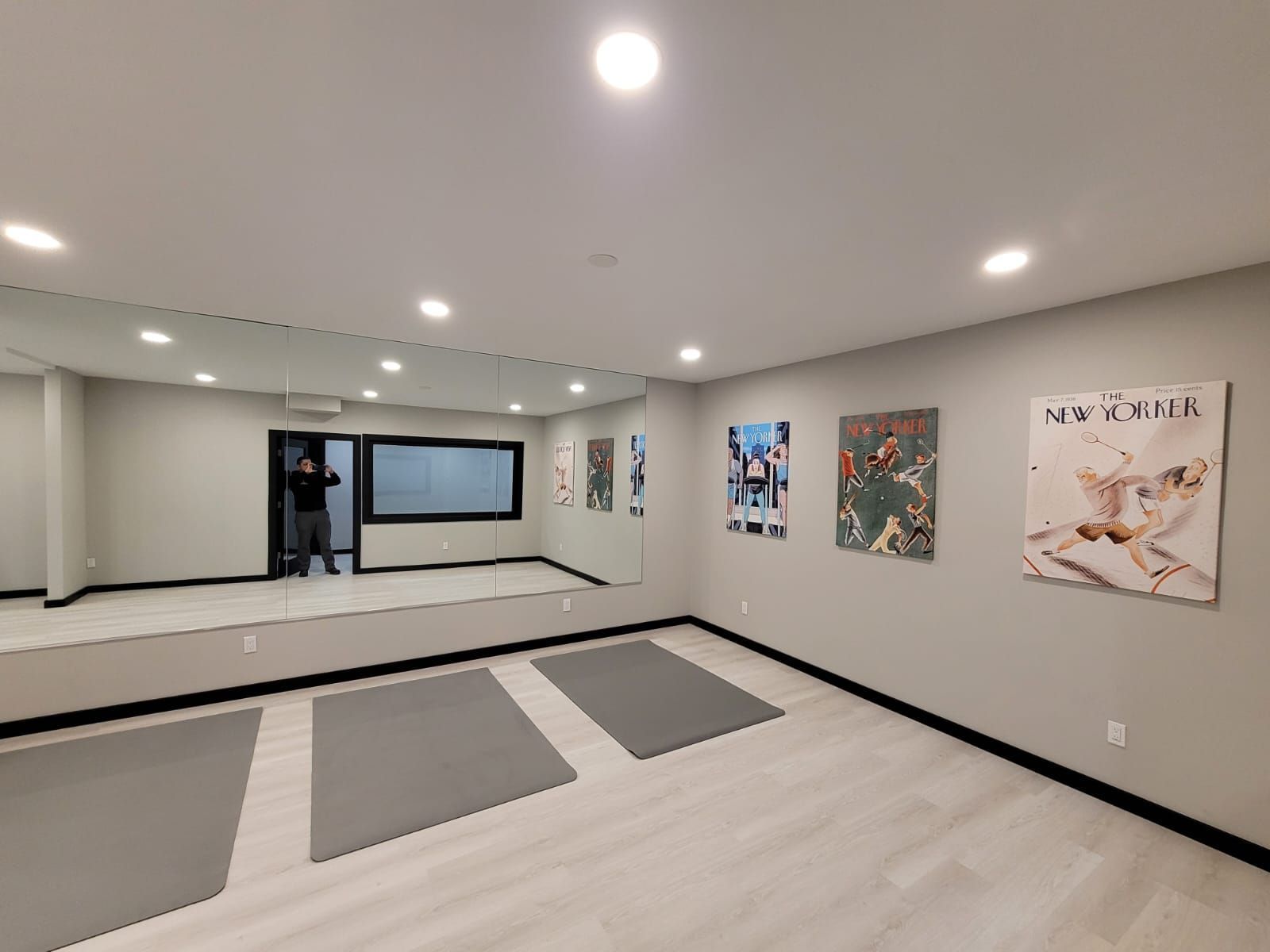 There is a large mirror in the middle of the room.