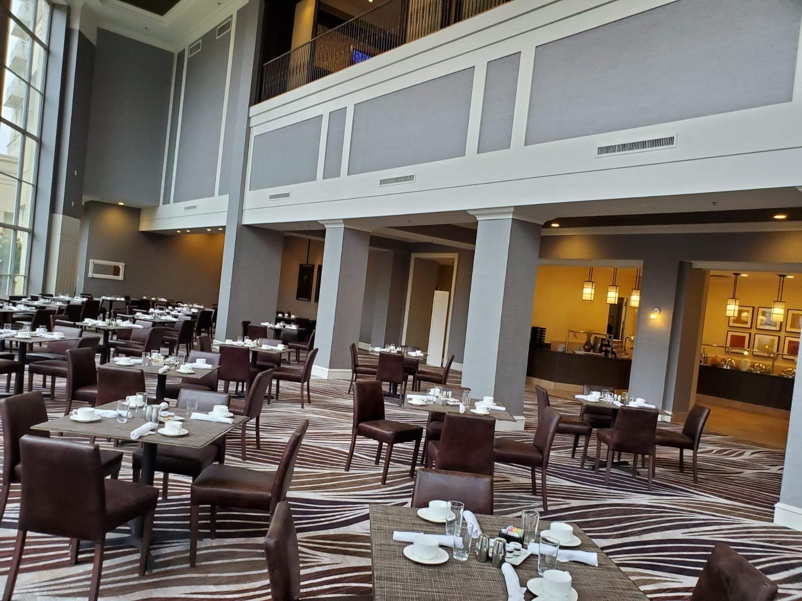 A large dining room filled with tables and chairs.