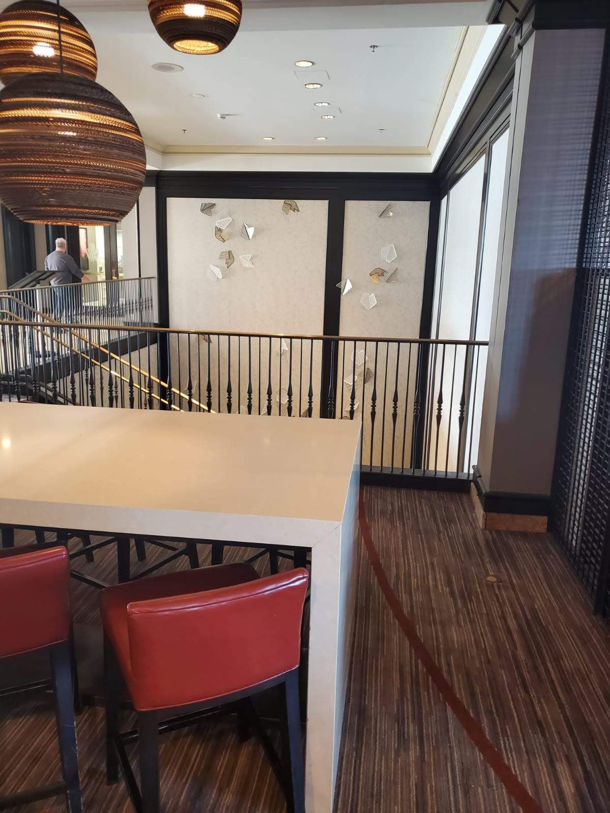 A room with a table and chairs in it