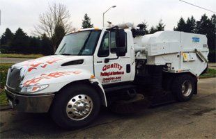 Quality Parking Lot Services' work truck