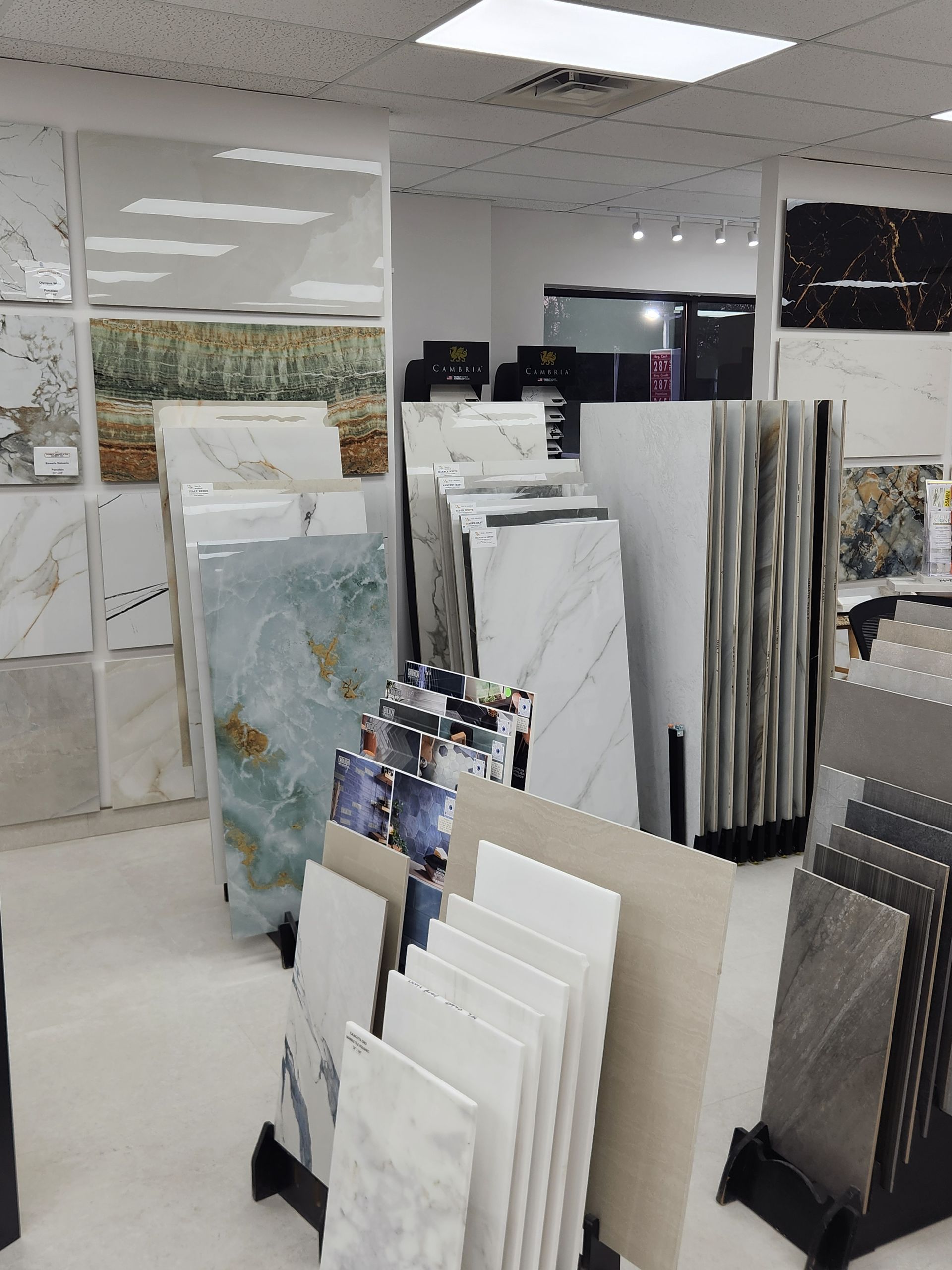 Tile store interior showcasing various tile samples in different colors and patterns