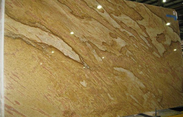 A large piece of marble is sitting on top of a table.