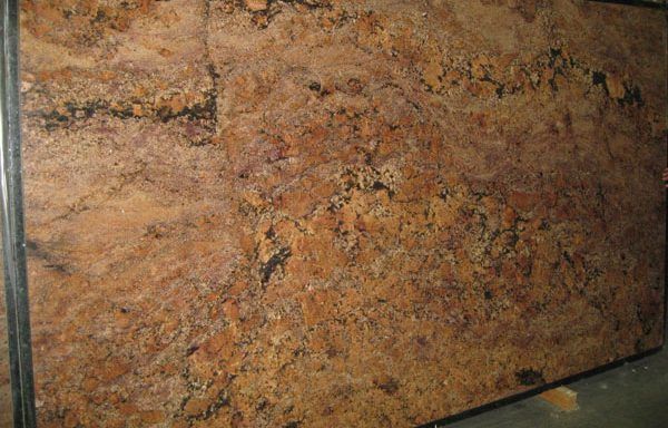 A large piece of granite is sitting on a table.