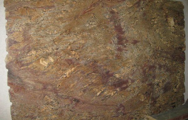 A close up of a piece of wood with a marble texture.