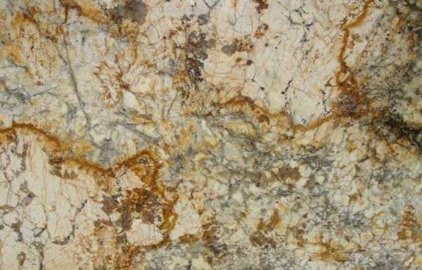 A close up of a granite counter top with a marble texture.