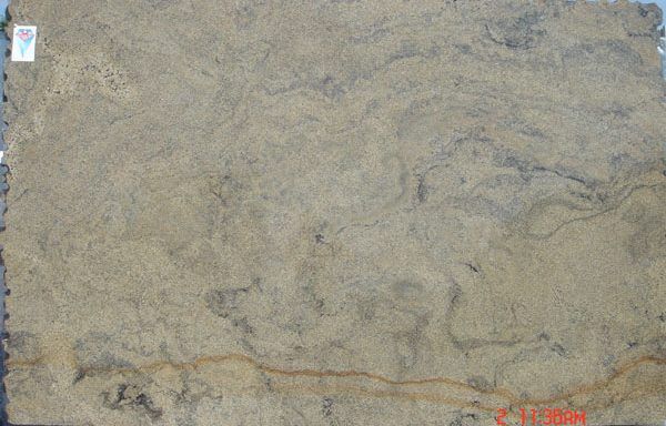 A piece of sand is sitting on top of a table.