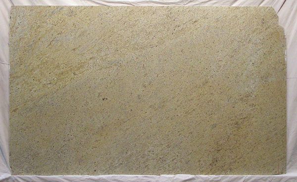 A large piece of paper is sitting on top of a white cloth.