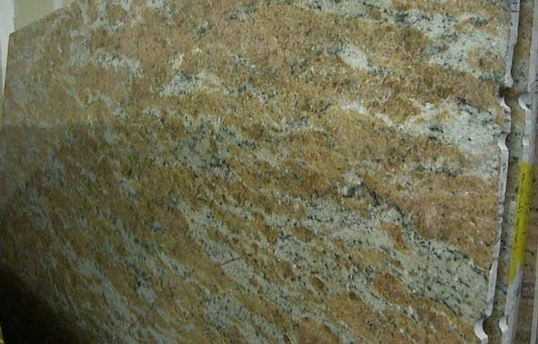 A large piece of granite is sitting on top of a table.