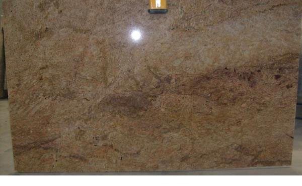 A large piece of granite is sitting on a table.