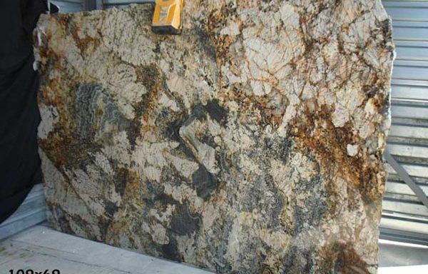 A large piece of granite is sitting on a table.